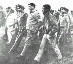 Pakistani army commander Lt. Gen. A.A.K. Niazi, second from right, escorted by General Officer Commanding in Chief of Indian and Bangladeshi Forces Lt. Gen Jagjit Singh Aurora, third from right, after the Pakistani forces surrendered on Dec. 16, 1971. (File photo)